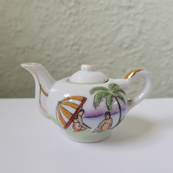 Polynesian Tiki Tea Cup, Saucer and Pot Island Beach Vintage Minature Souvenir. - Picture 2 of 11